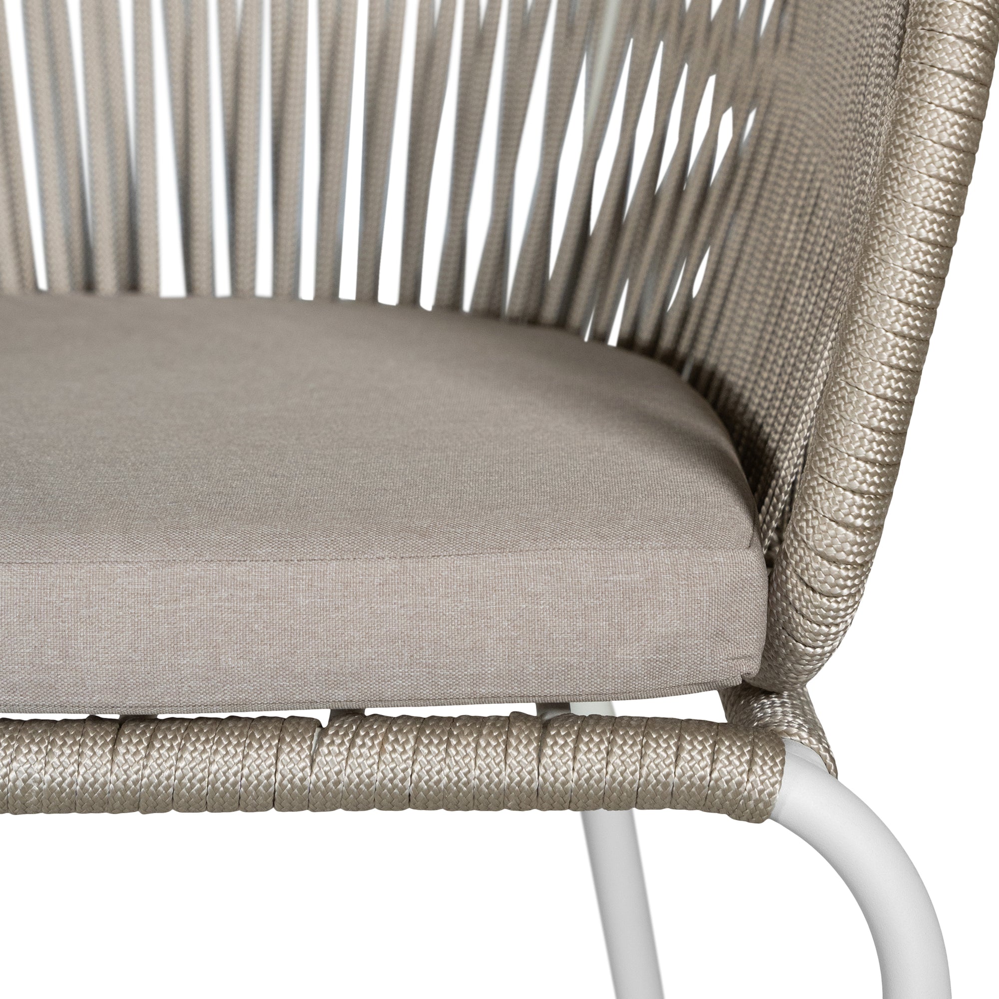 White and natural outdoor dining chair featuring a woven rope backrest and sleek metal legs, designed for modern alfresco dining and stylish patio settings