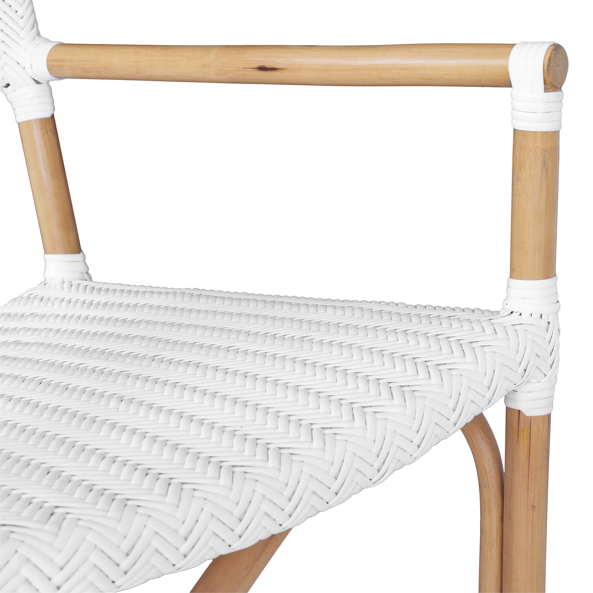 White herringbone rattan armchair with armrests and a sturdy cross-frame base, showcasing a contemporary design suitable for indoor or outdoor dining spaces.