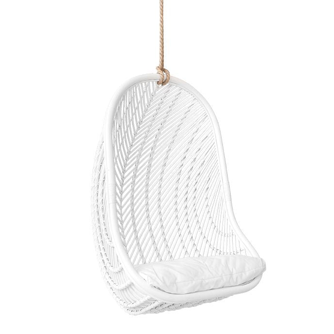 White rattan hanging egg chair with a plush white cushion, featuring a woven open-weave design and sturdy rope for a stylish and relaxing indoor or outdoor seating option