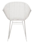 White rattan dining chair with curved back and slim metal legs, perfect for modern and stylish dining settings