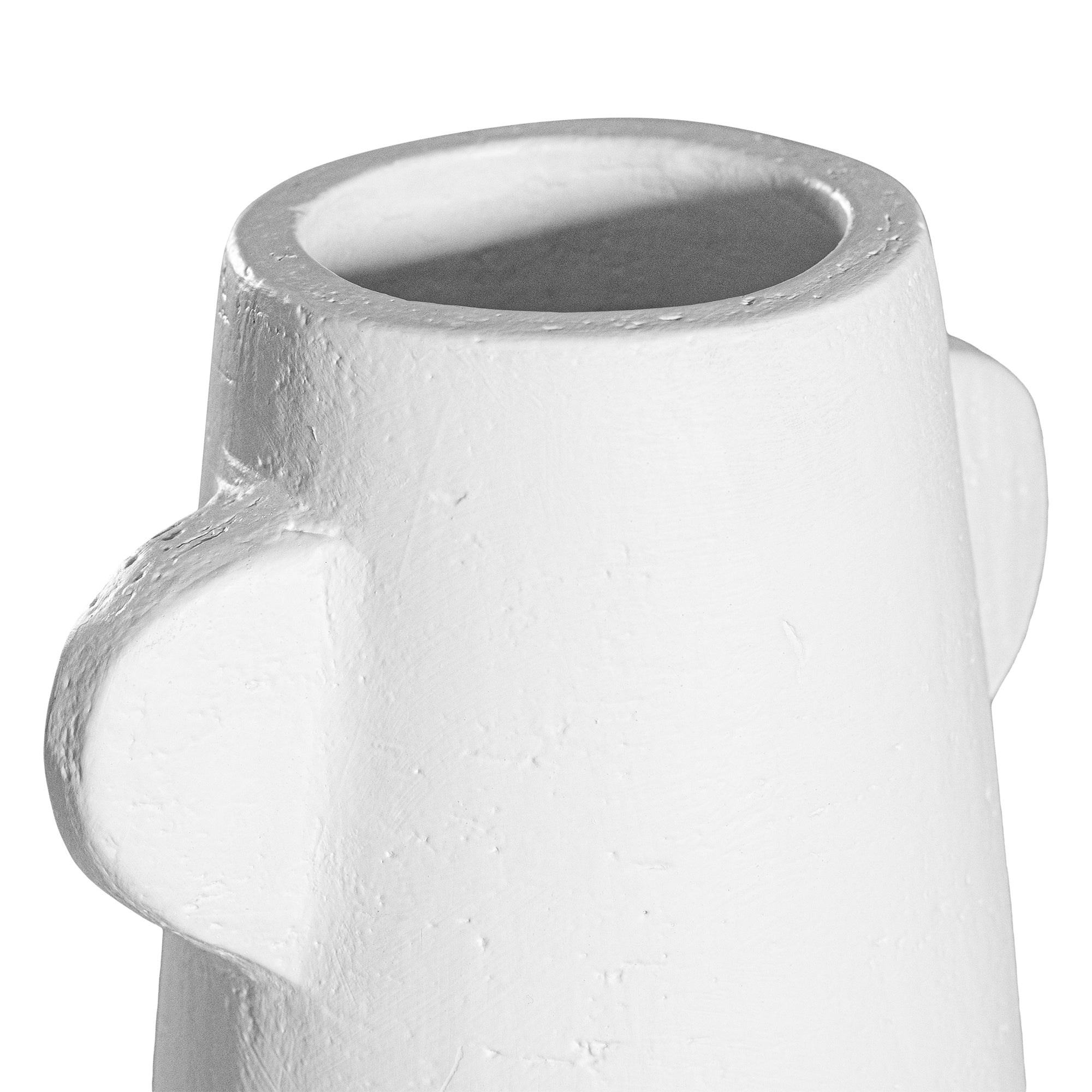 White sculptural vase with unique handles, adding a touch of contemporary elegance to home decor