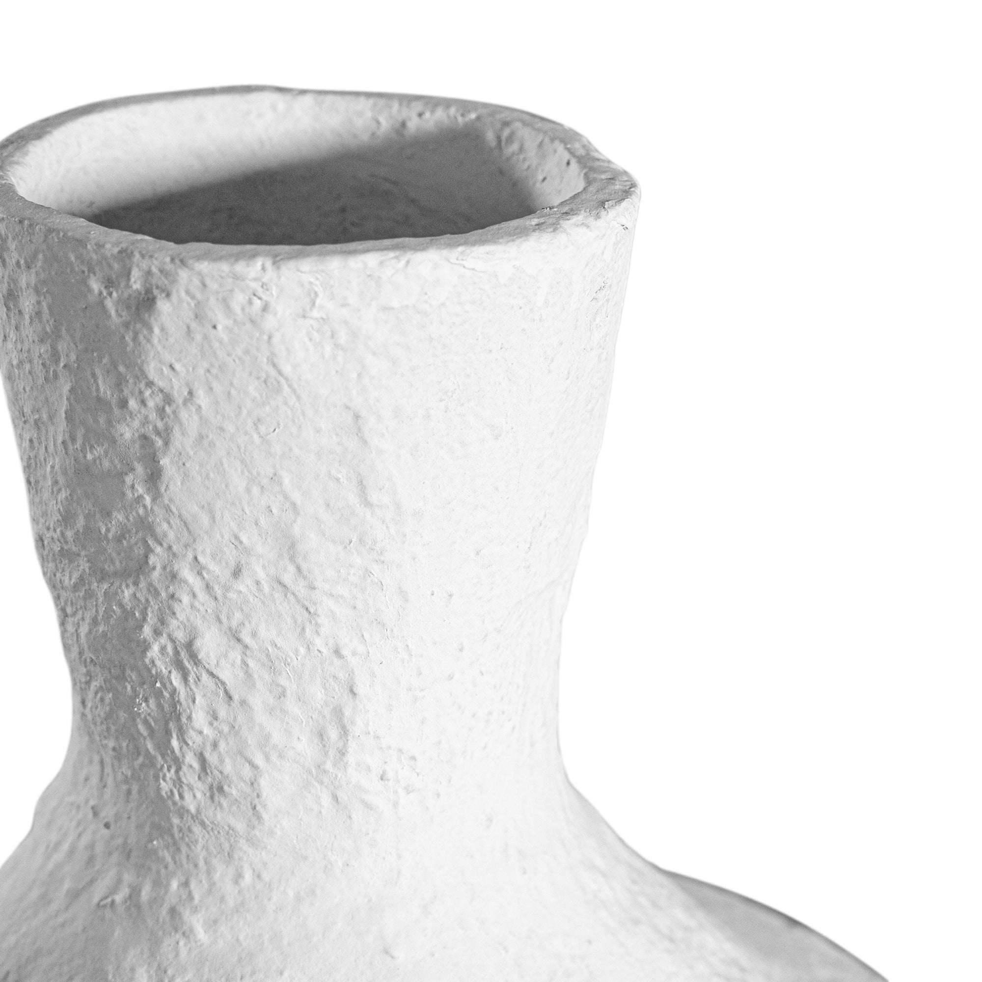 A sculptural white decorative vase with a textured finish, adding an organic, artisanal touch to modern interiors