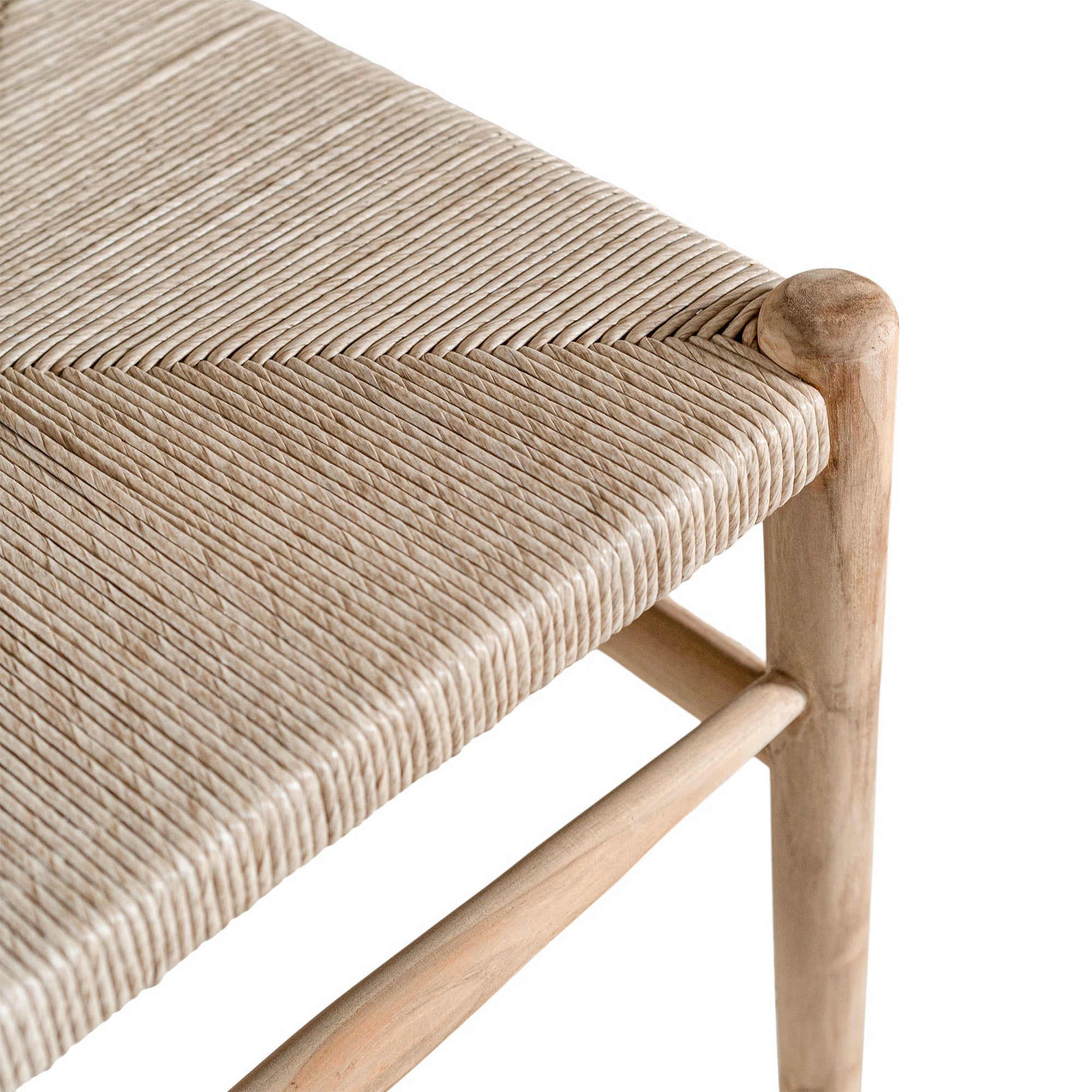 A natural timber wishbone dining chair with a handwoven rope seat, featuring an iconic curved backrest and minimalist Scandinavian-inspired design. Perfect for modern coastal and contemporary interiors, offering both style and comfort