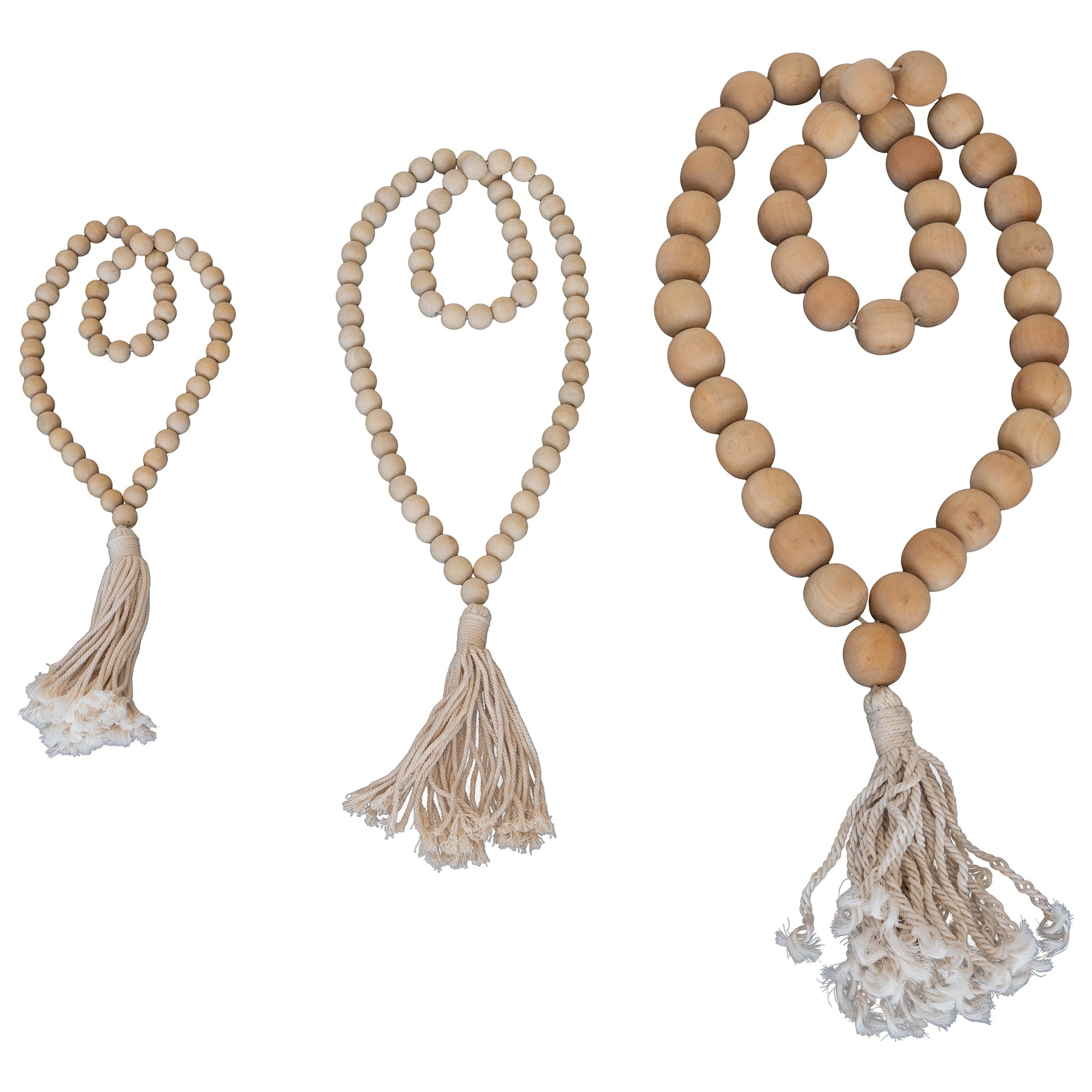Natural wood bead garland with tassel, perfect for adding rustic charm and texture to home decor
