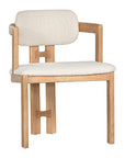 Contemporary wooden dining chair with a natural oak frame and boucle upholstered seat and backrest, designed for modern comfort and style