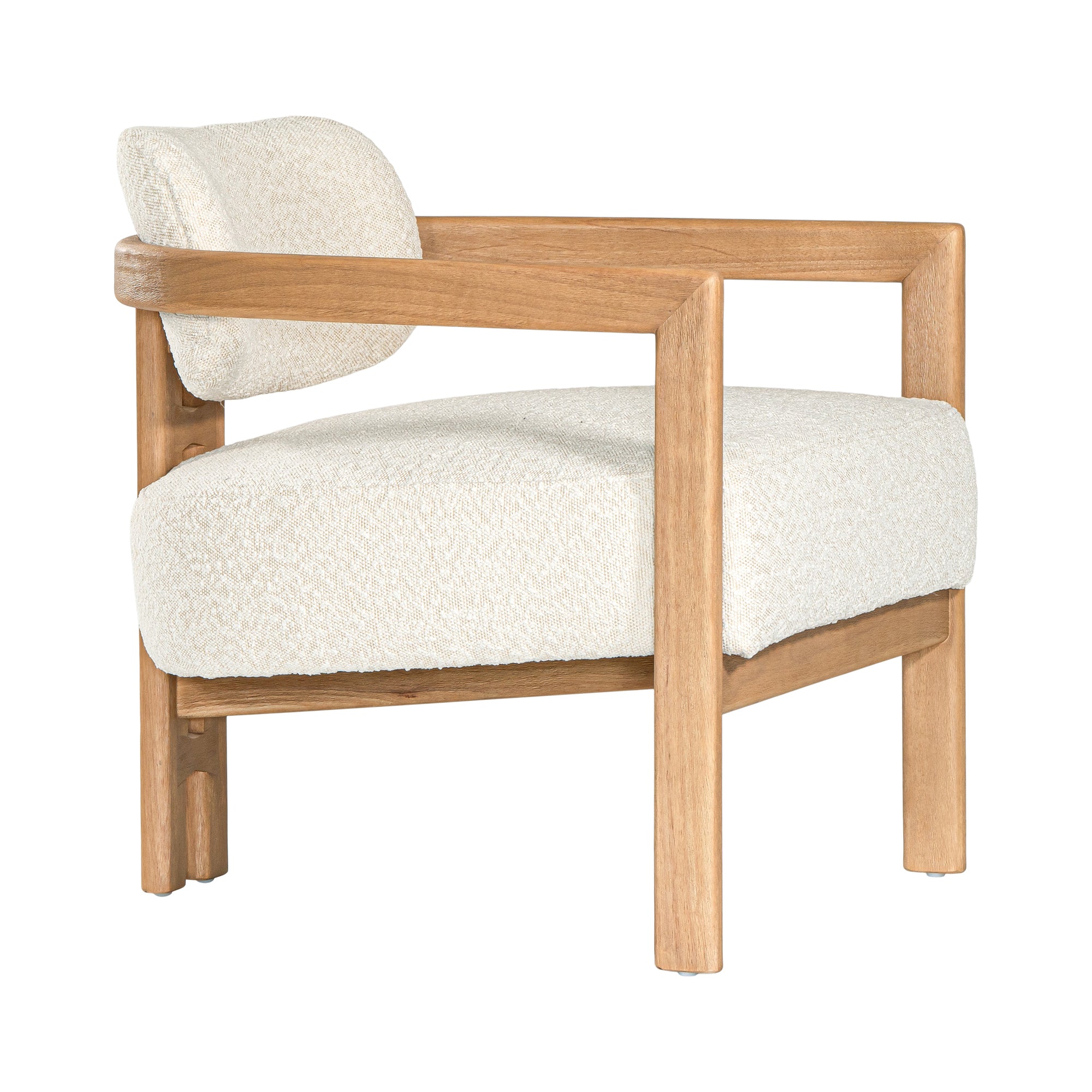 Stylish wooden occasional chair with boucle upholstery, set in a minimalist dining space with a sculptural stone table and an olive tree in a textured planter