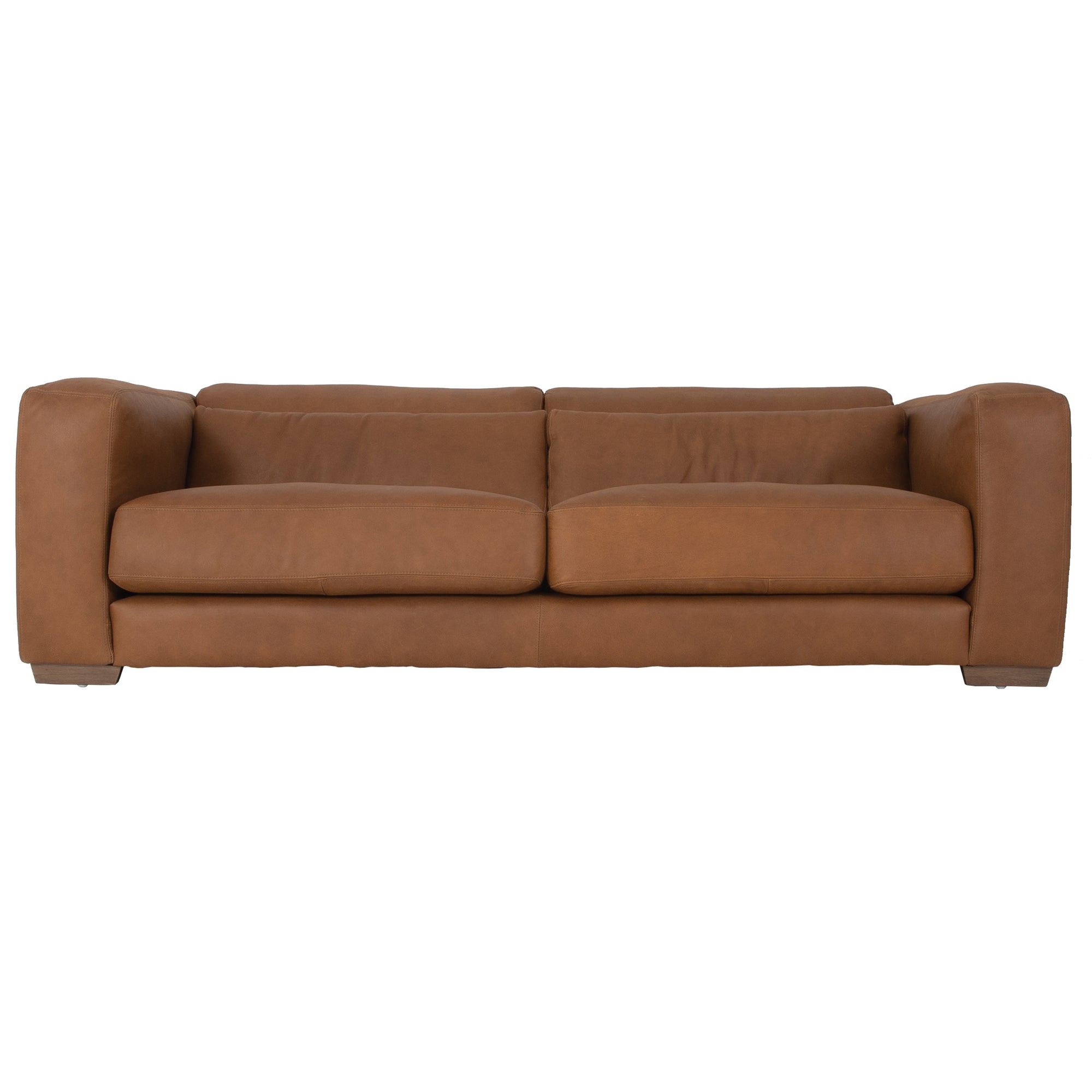 Modern leather upholstered sofa with soft, rounded cushions and light wooden legs