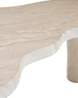 Zuburu coffee table in dune hydro dipped finish with organic shaped top and three cylindrical pedestal legs.