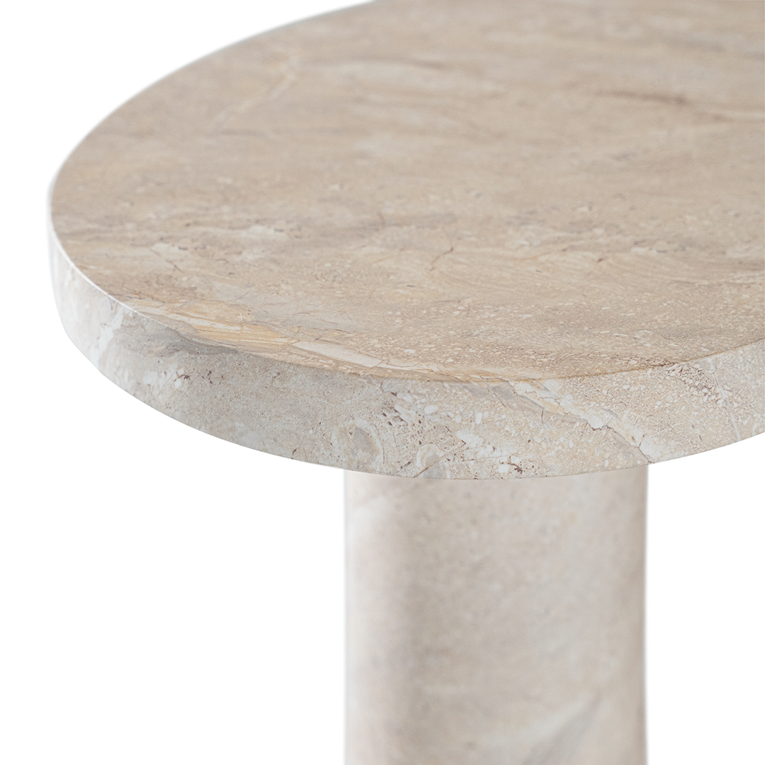 Zuburu coffee table in dune hydro dipped finish with organic shaped top and three cylindrical pedestal legs.