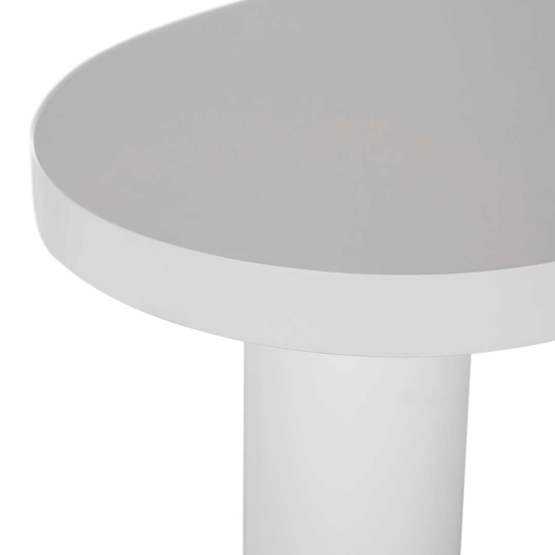 Zuburu coffee table in white concrete finish with organic curved tabletop and cylindrical pillar legs.