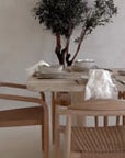 kulala-living-natural-wood-dedon-dining-chair-woven-seat-setting