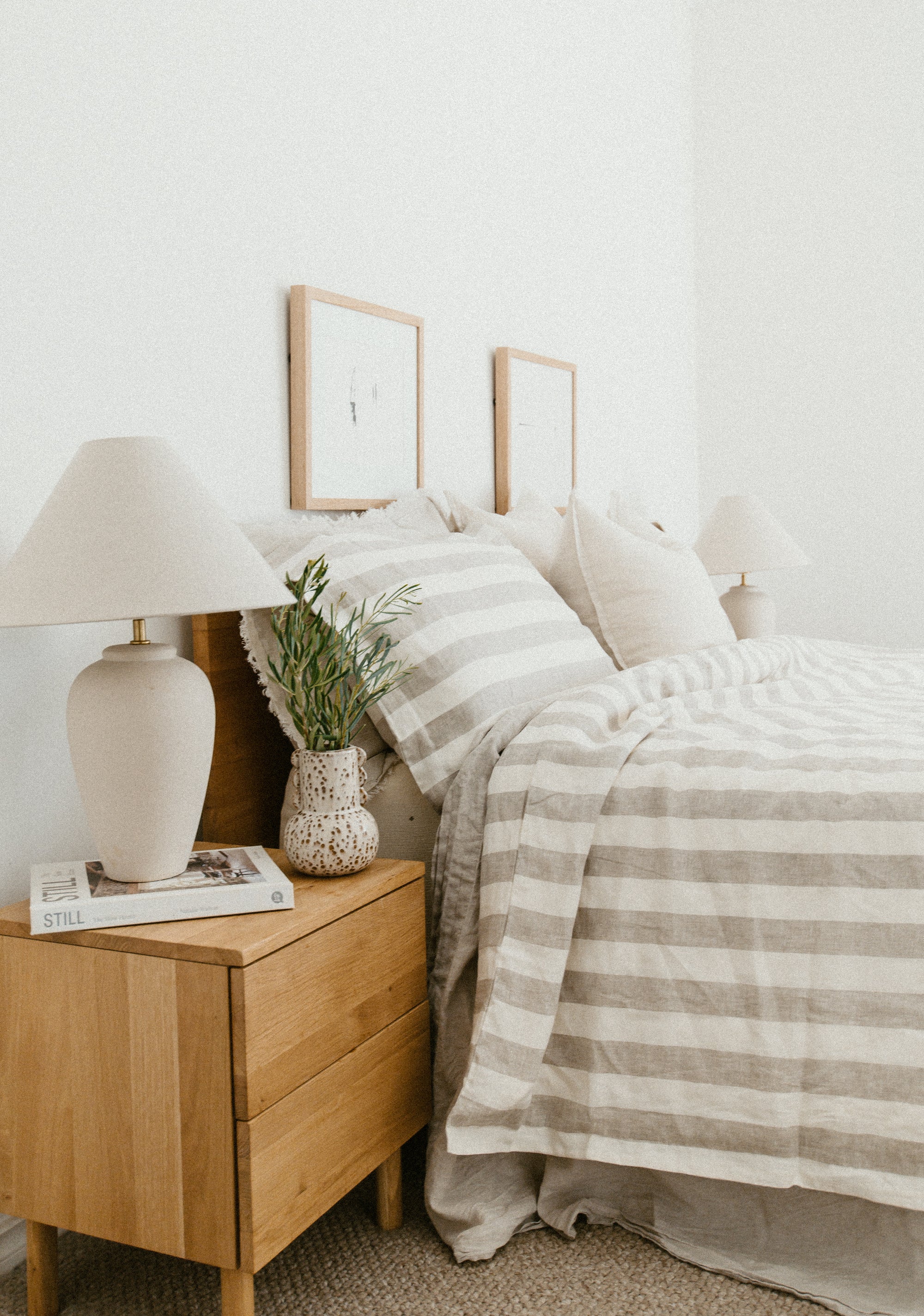 SOL Linen Noemi linen duvet cover displayed on a bed with a soft, textured beige fabric for a cozy, stylish bedroom look.
