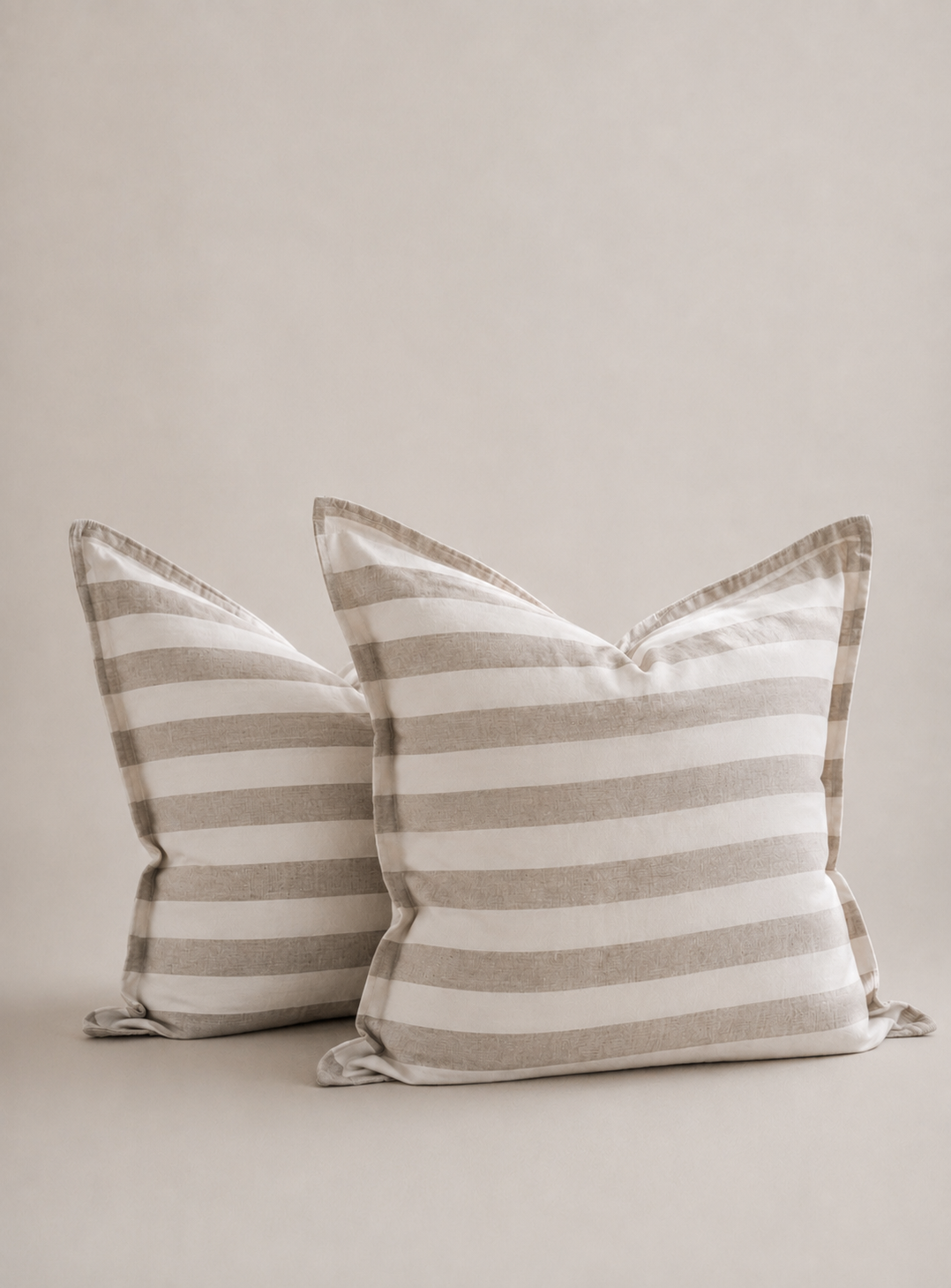 Set of two SOL Linen Noemi European pillowcases in soft linen fabric, displayed on a cozy bed for bedding decor.