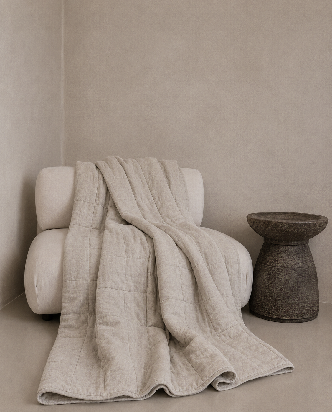 SOL Linen Sable quilted coverlet on a bed, showcasing soft linen bedding with a textured quilted pattern for a cozy, elegant look.