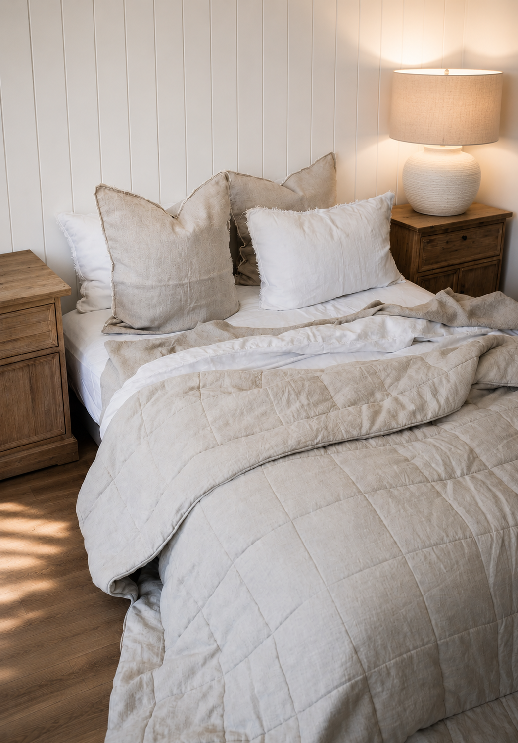 SOL Linen Sable linen quilted coverlet on bed, showcasing textured bedding with a soft, neutral color for cozy bedroom decor.