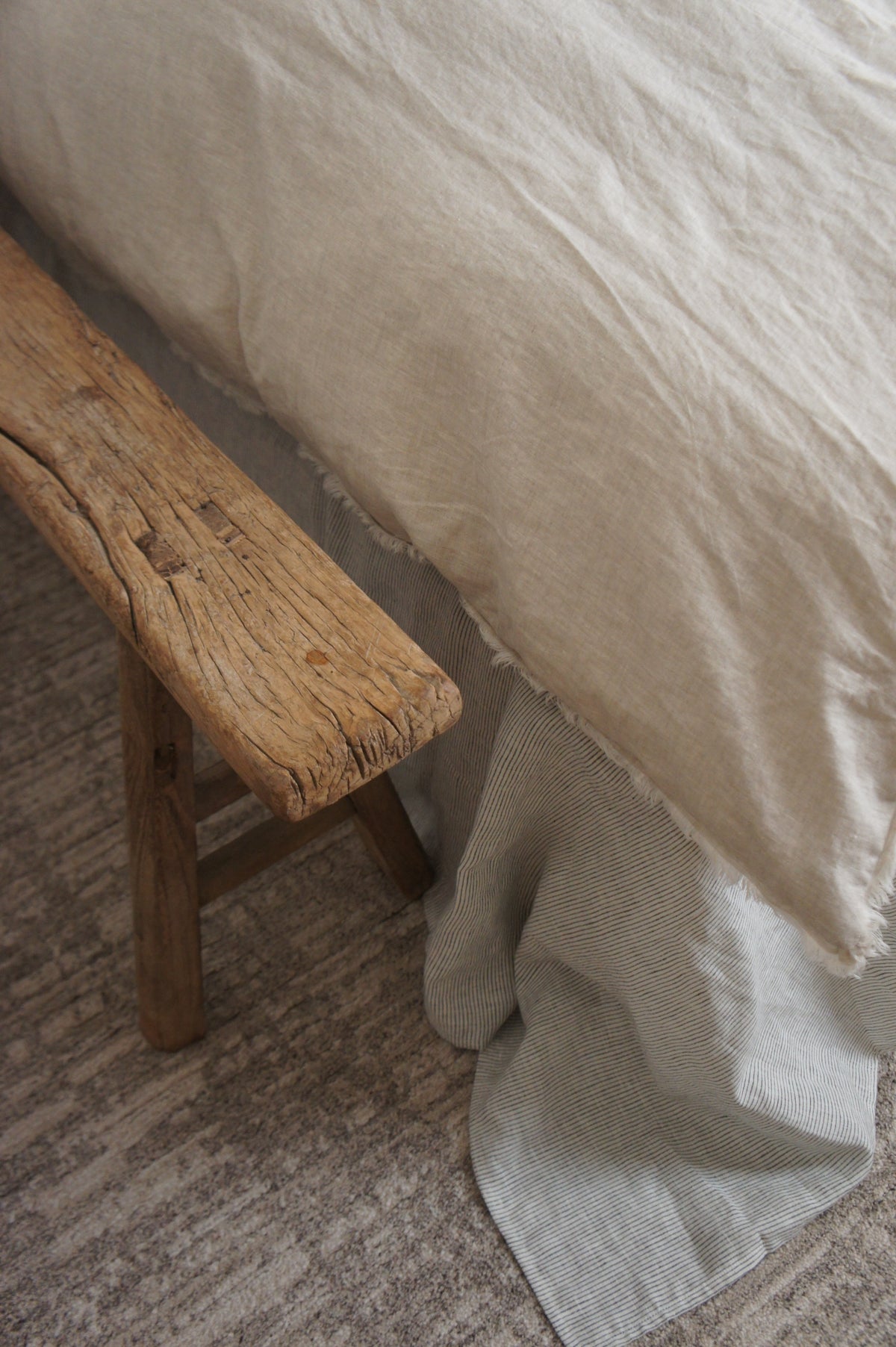 SOL Linen Sable frayed linen duvet cover laid on bed, showcasing textured beige bedding with a relaxed, stylish look.