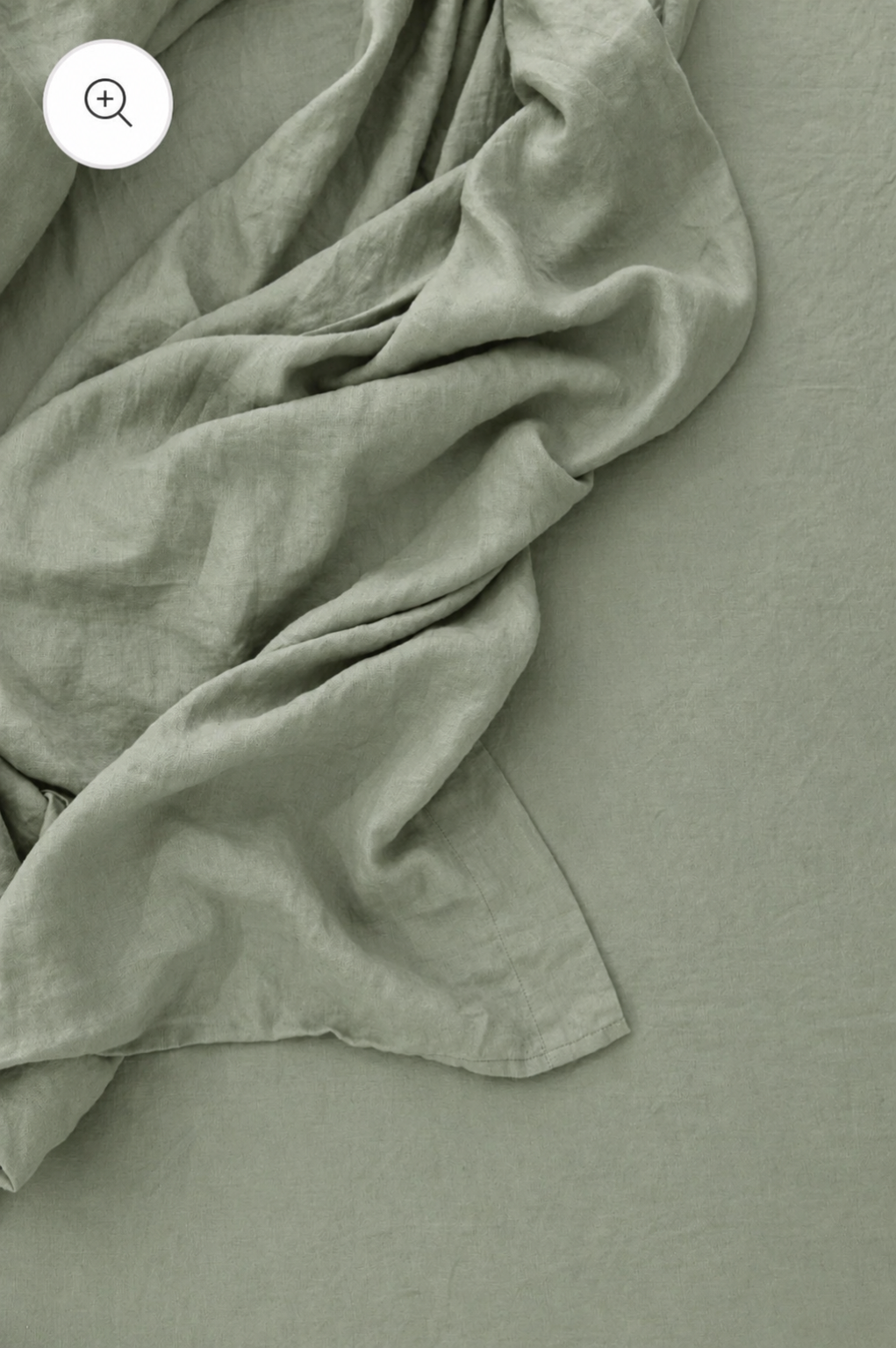 SOL Linen Sea Mist linen duvet cover displayed on a bed with matching pillowcases, showcasing soft, textured fabric for stylish bedding.