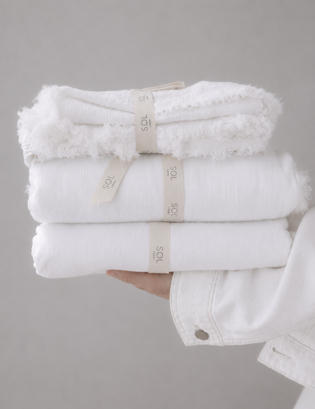 SOL Linen Whistler linen fitted sheet on a bed, showcasing soft, breathable bedding in a cozy bedroom setting.