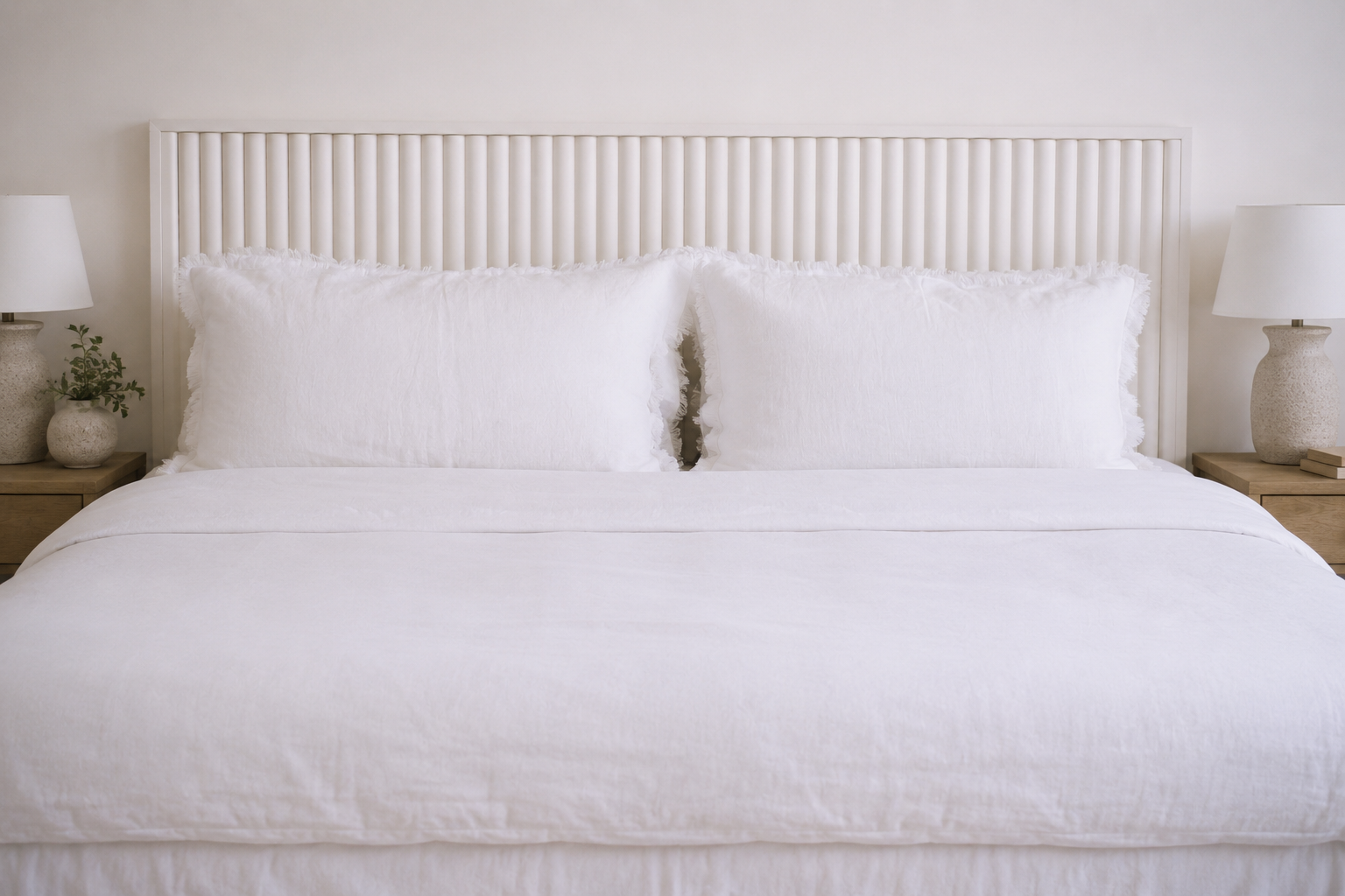 Set of two SOL Linen Whistler frayed linen pillowcases for bedding, featuring a natural, relaxed style with frayed edges.