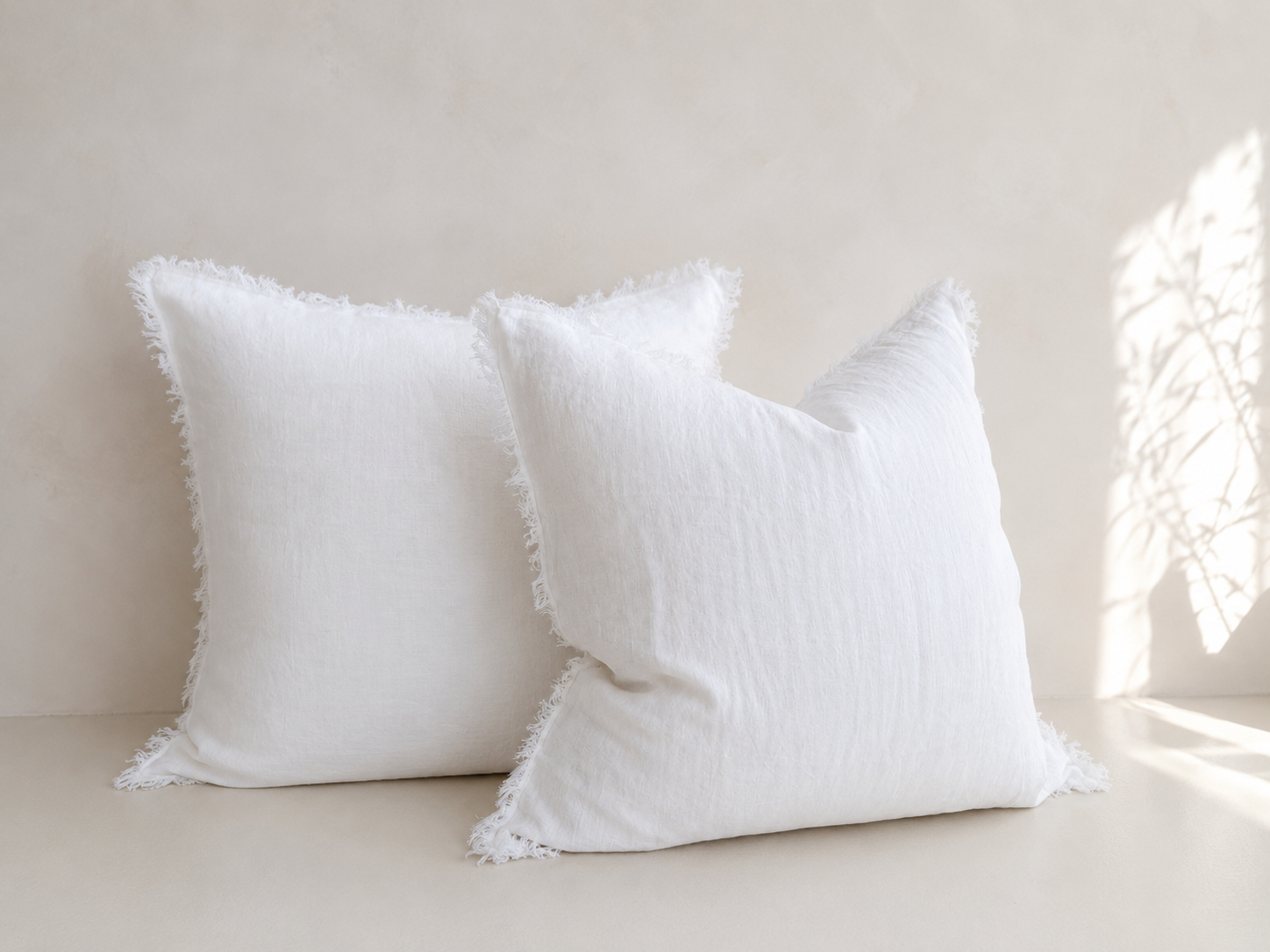 Set of two SOL Linen Whistler Frayed Linen European pillowcases showcasing soft, natural linen fabric with frayed edges for a relaxed look.