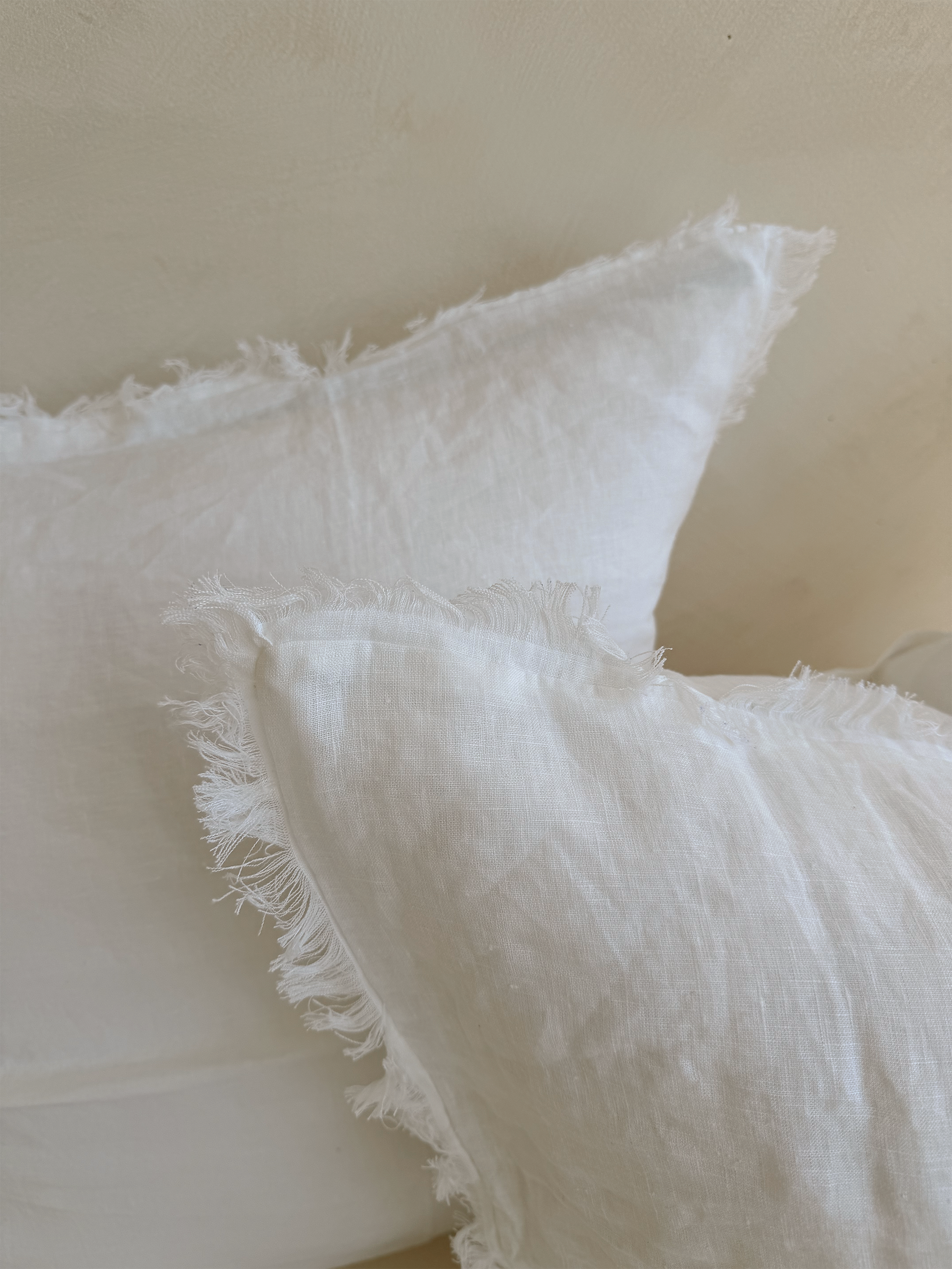 Pair of SOL Linen Whistler frayed linen European pillowcases, soft and stylish bedding for a relaxed bedroom look.